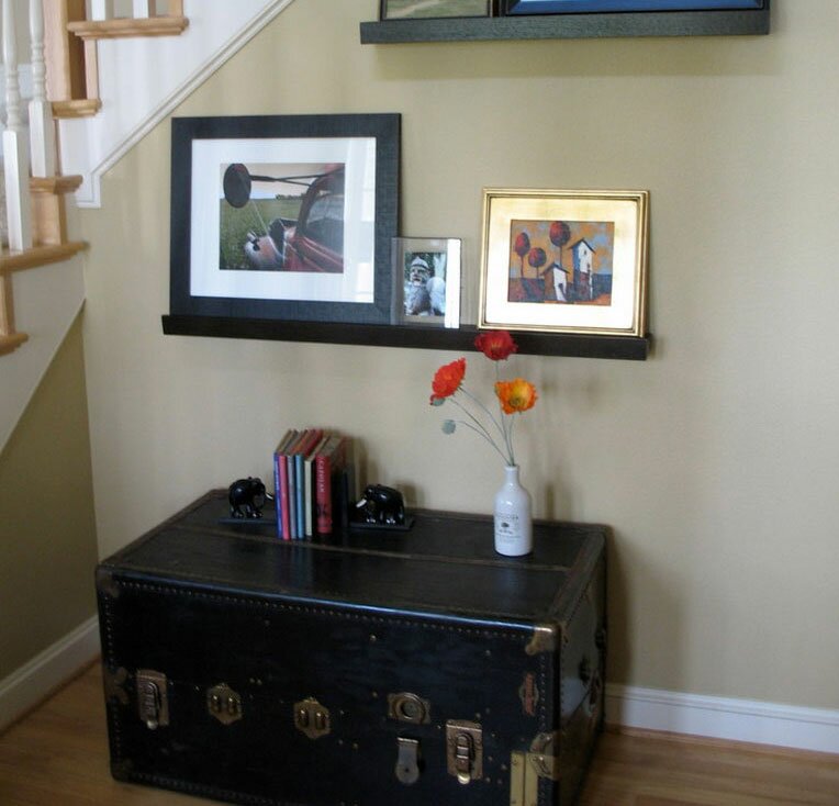 Trunk used as sidetable and storage in hallway